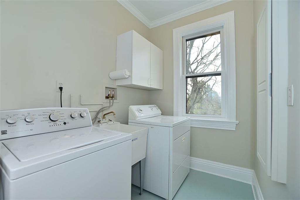 304 Bower Hill Road Pittsburgh, PA 15228 - Photo 20 of 25 Second floor laundry room makes life so much easier! This room is sunlit and feature high ceilings, crown molding, and a built in ironing board!