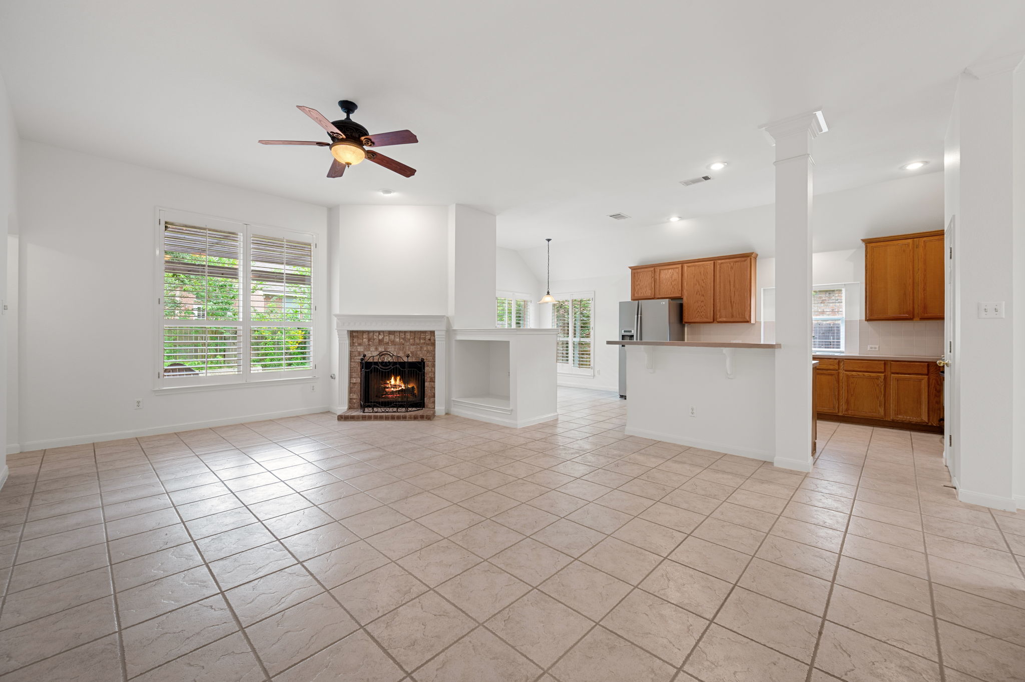 9201 La Siesta Bend Austin, TX 78749 - Photo 5 of 37 a view of a livingroom with furniture a fireplace and window