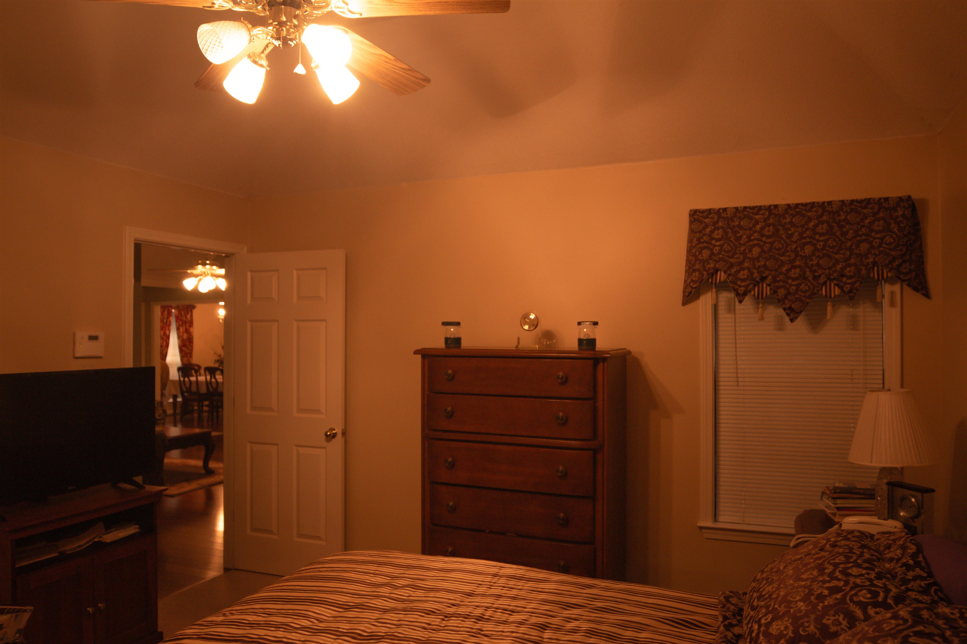 4100 Altruria Road Bartlett, TN 38135 - Photo 14 of 23 Bedroom featuring ceiling fan and hardwood / wood-style floors