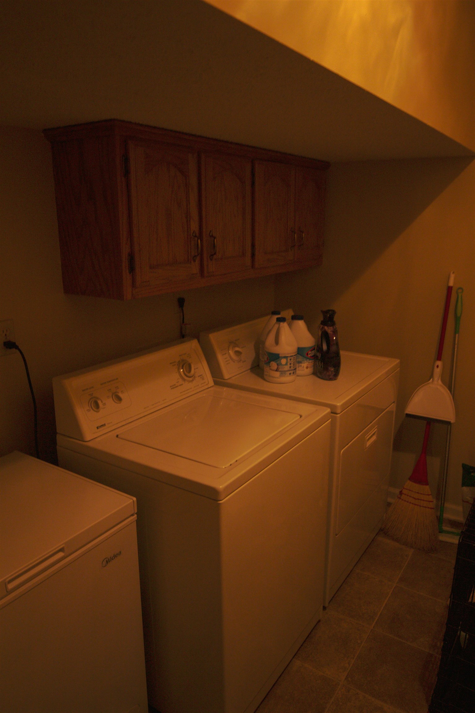 4100 Altruria Road Bartlett, TN 38135 - Photo 18 of 23 Laundry area featuring tile patterned flooring, independent washer and dryer, and cabinets