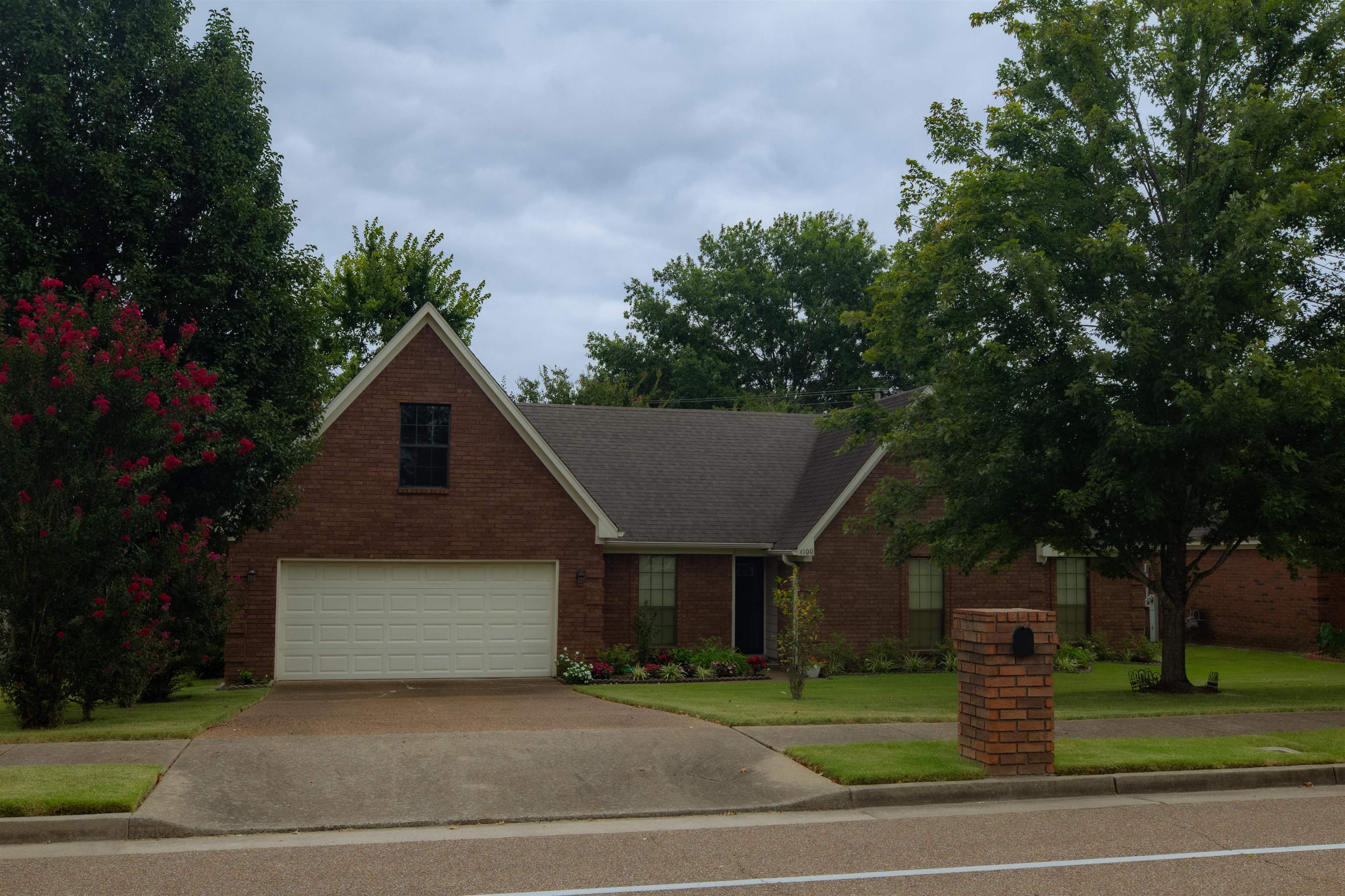 4100 Altruria Road Bartlett, TN 38135 - Photo 2 of 23 View of front of home with a garage and a front yard