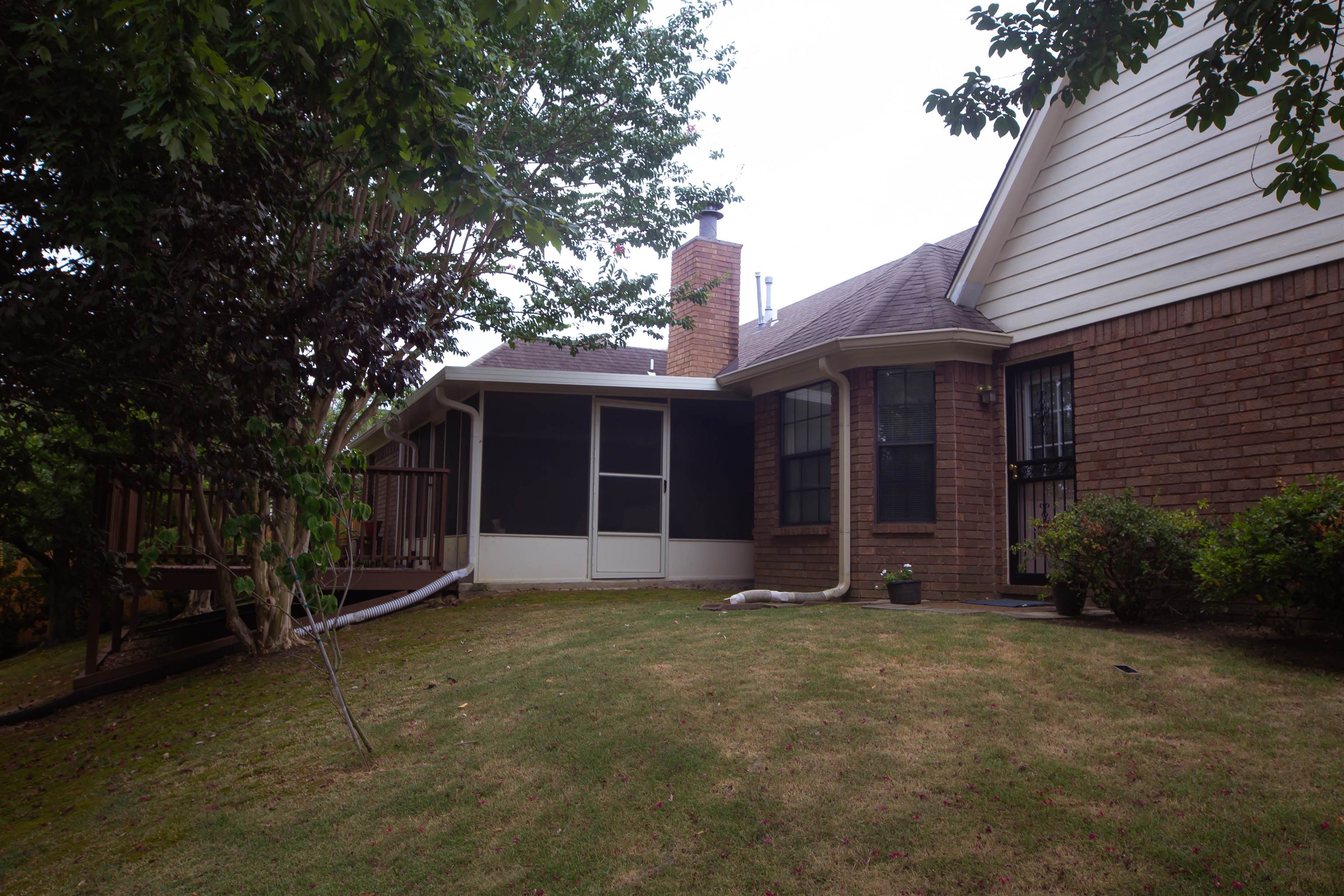4100 Altruria Road Bartlett, TN 38135 - Photo 22 of 23 View of yard featuring a sunroom
