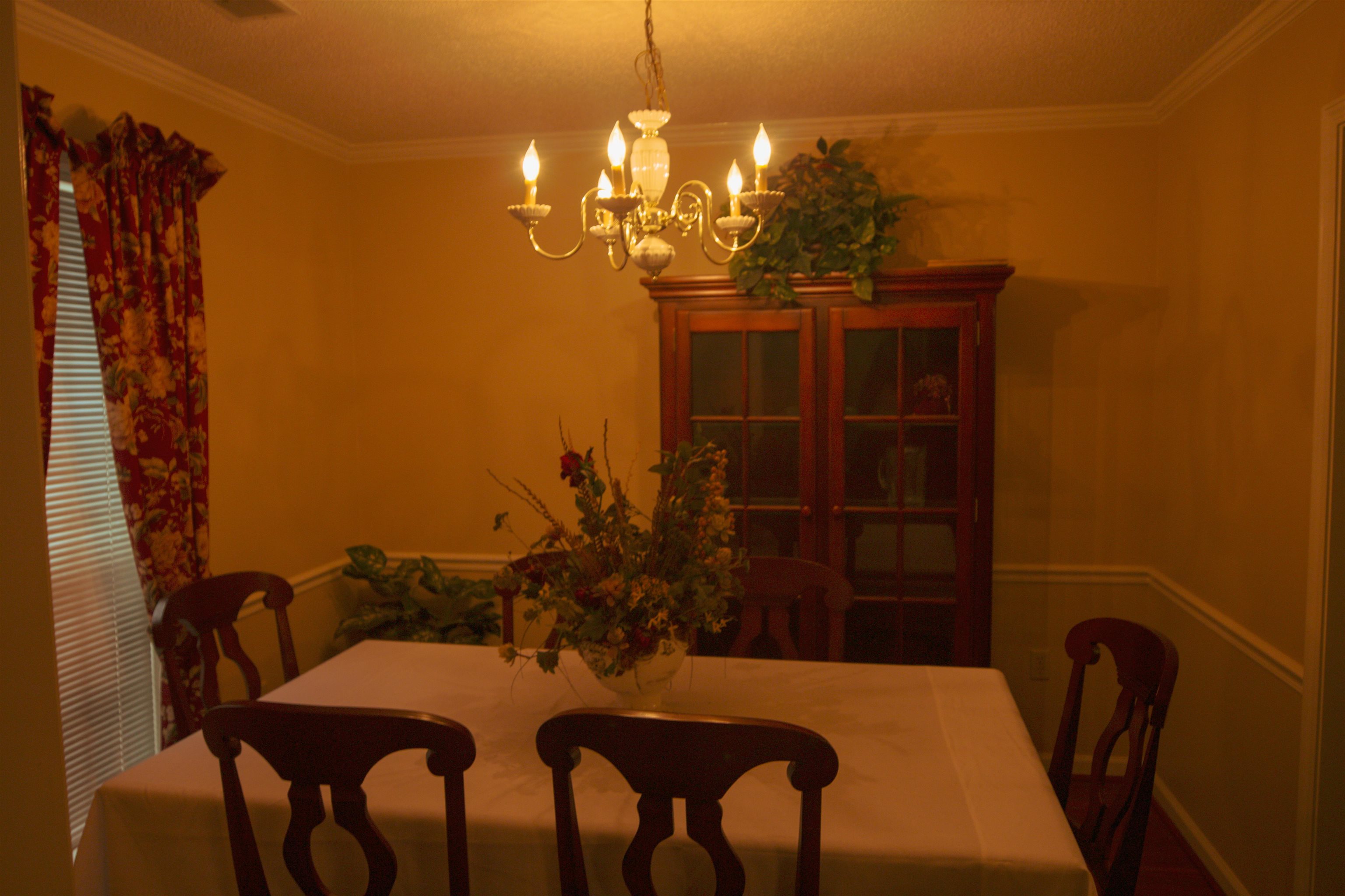 4100 Altruria Road Bartlett, TN 38135 - Photo 7 of 23 Dining area featuring a chandelier and ornamental molding