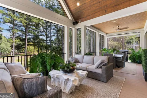 a outdoor living space with furniture and garden view