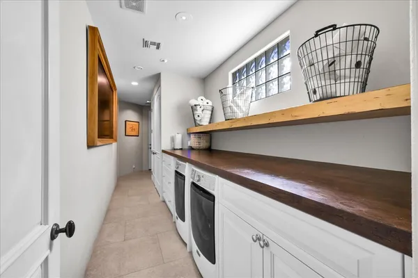 a house view with a seating space and garden