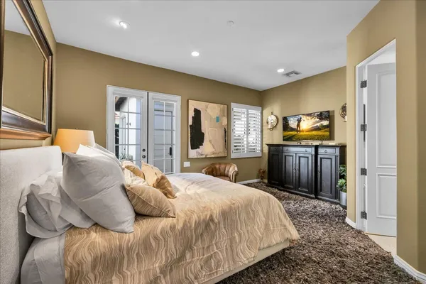 a spacious bathroom with a double vanity sink mirror and double