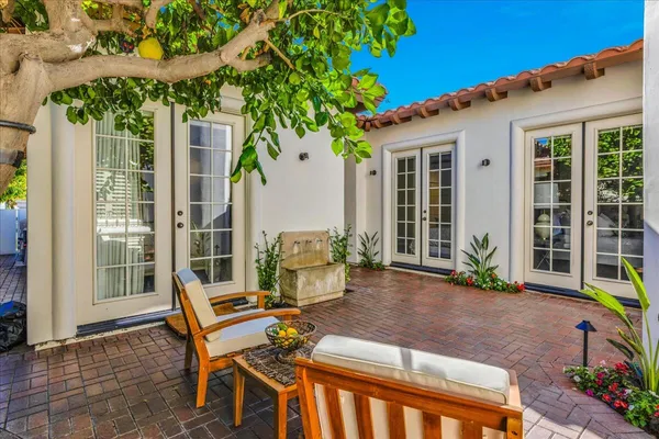 a living room with furniture and a rug