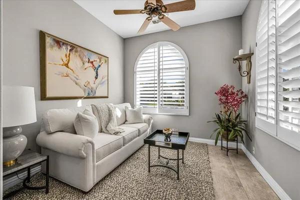 a view of a grassy area with an ocean