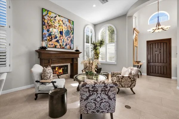 a dining room with furniture and window