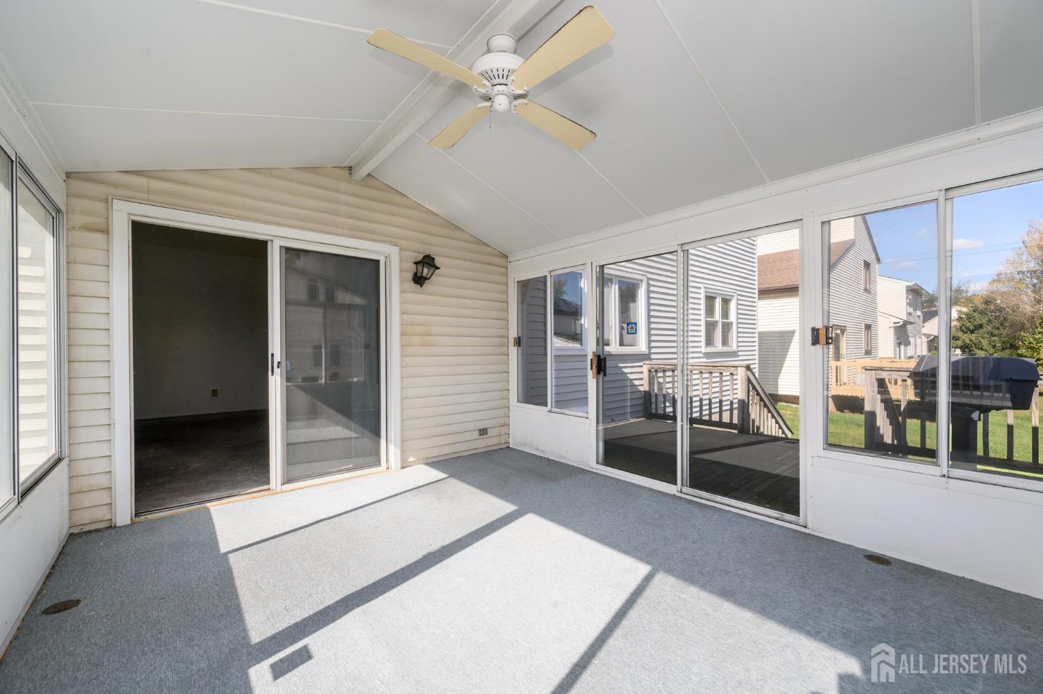 112 Apple Tree Lane Union, NJ 07083 - Photo 18 of 46 a spacious bedroom with a large bed and a chandelier