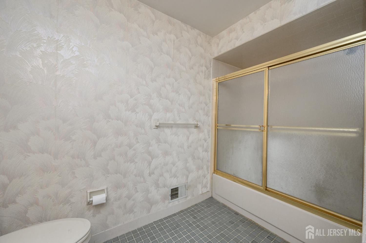 112 Apple Tree Lane Union, NJ 07083 - Photo 24 of 46 a bathroom with a granite countertop shower and a toilet