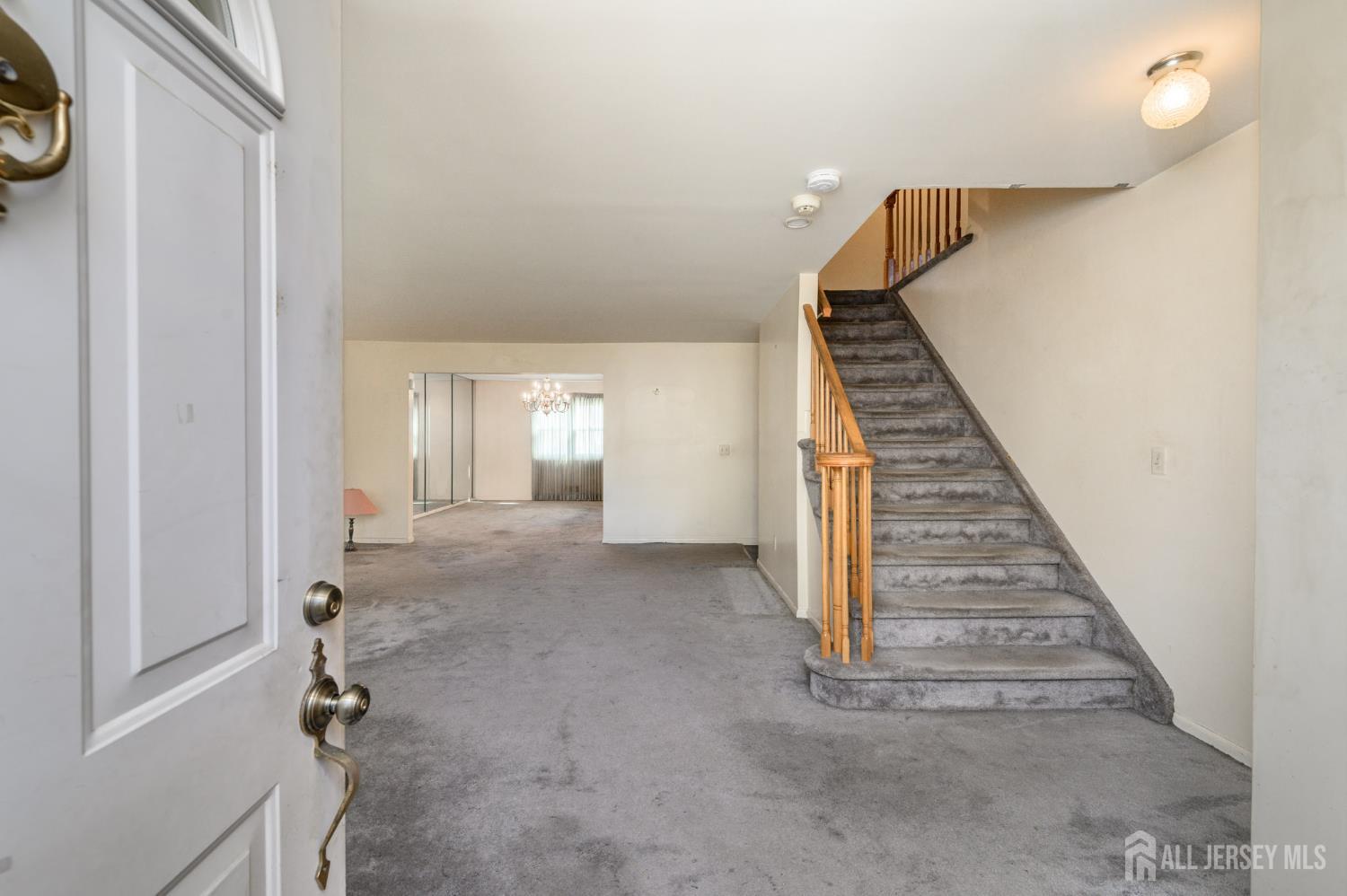 112 Apple Tree Lane Union, NJ 07083 - Photo 3 of 46 a view of a hallway with staircase