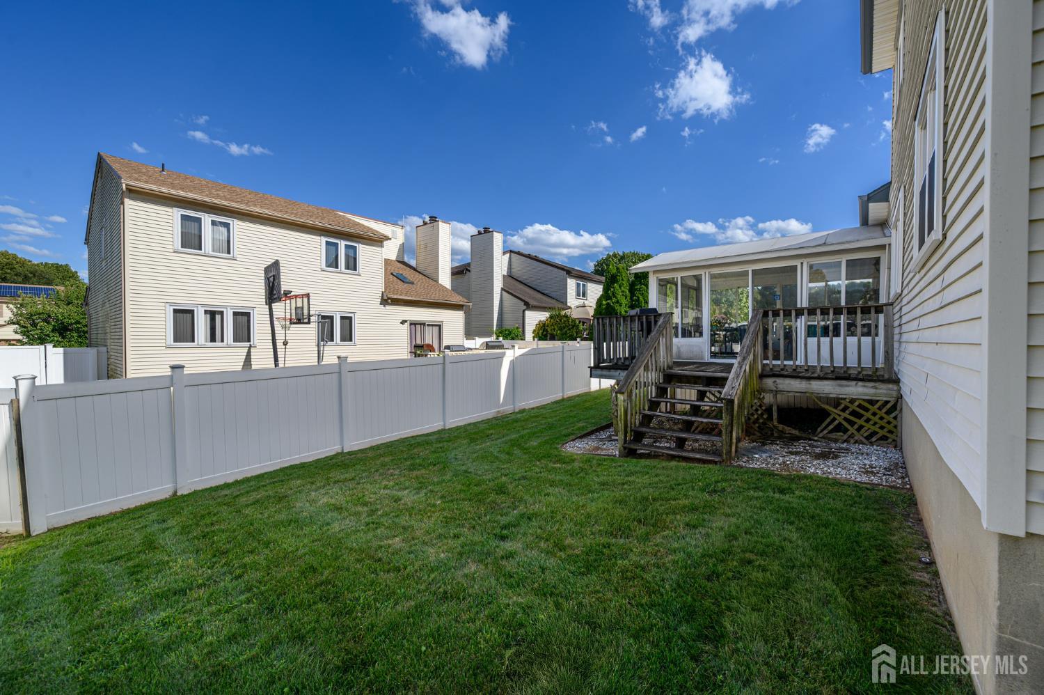 112 Apple Tree Lane Union, NJ 07083 - Photo 37 of 46 a view of a house with backyard porch and sitting area
