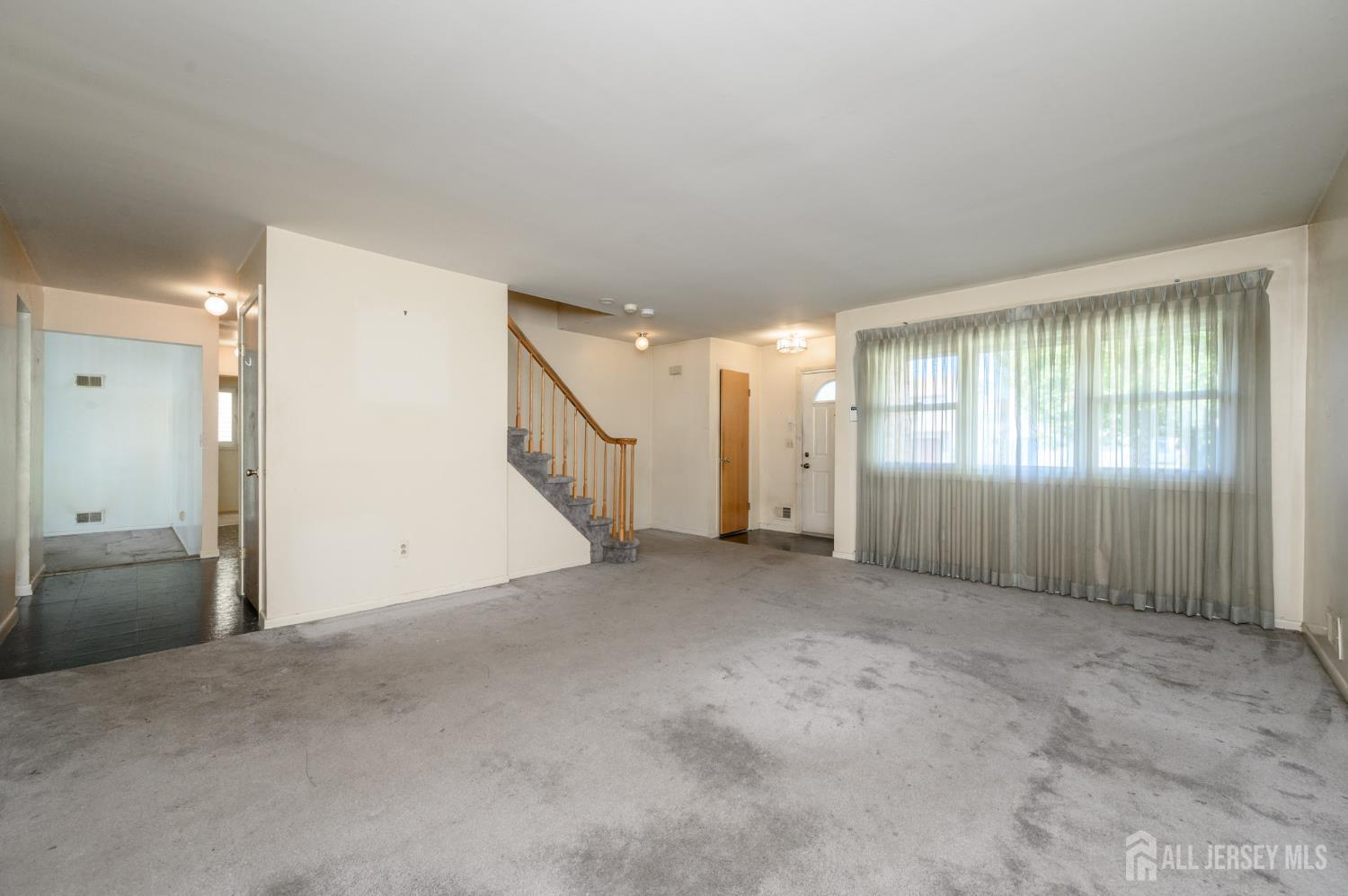 112 Apple Tree Lane Union, NJ 07083 - Photo 5 of 46 an empty room with windows