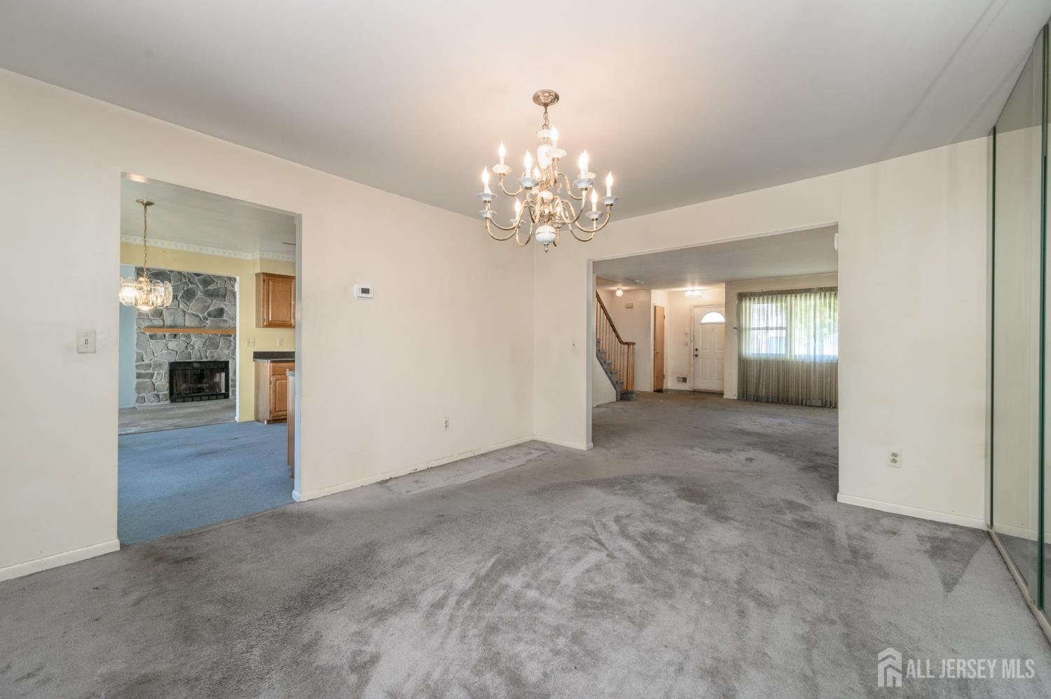 112 Apple Tree Lane Union, NJ 07083 - Photo 8 of 46 a view of livingroom with chandelier