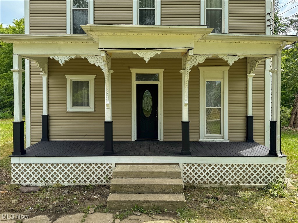 6118 Institute Road Rome, OH 44085 - Photo 17 of 27 Entrance to property featuring a porch