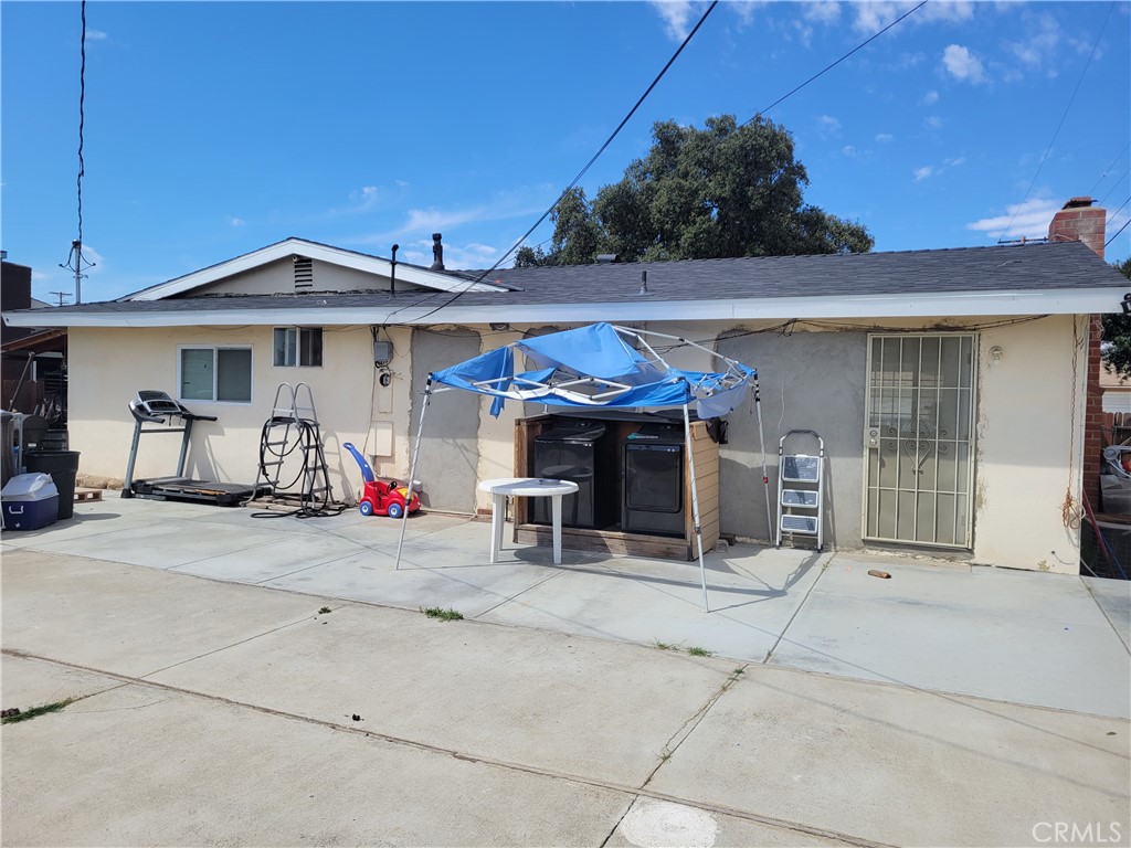 5240 Appleton Street Riverside, CA 92504 - Photo 3 of 16 a view of a car park in front of house