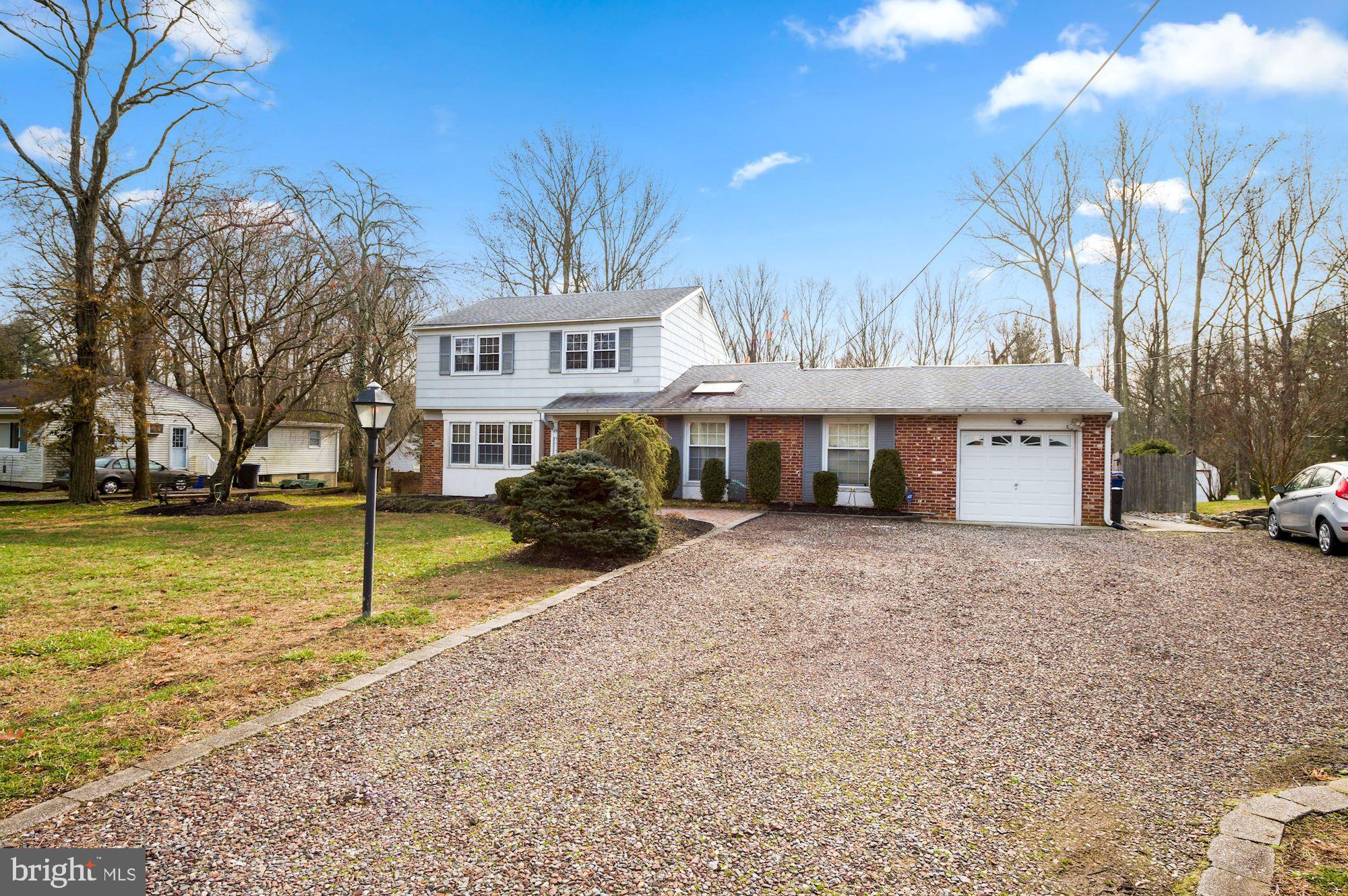 15 Christopher Mill Road Medford, NJ 08055 - Photo 22 of 54 Front of home, amazing wide driveway.