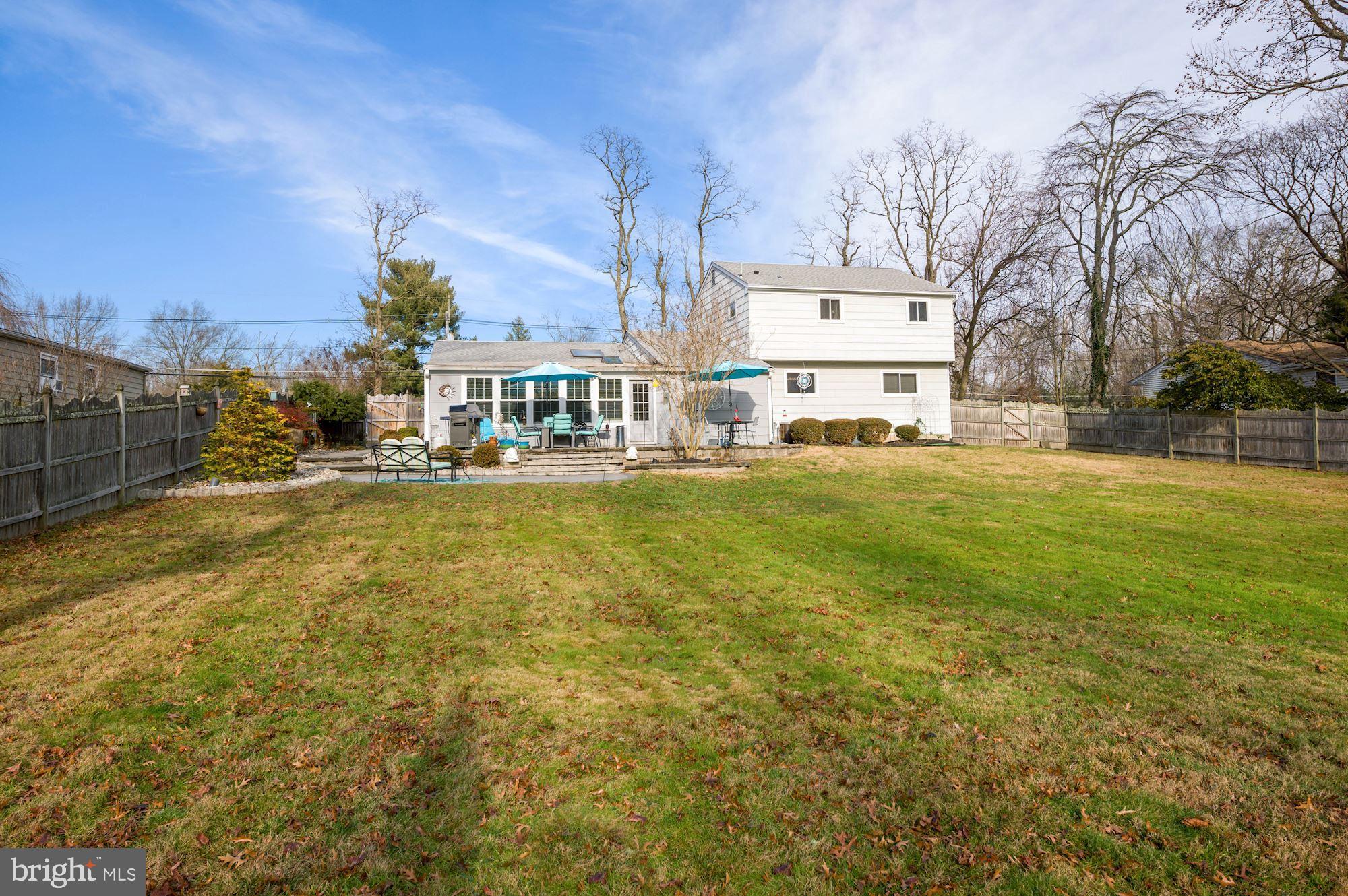 15 Christopher Mill Road Medford, NJ 08055 - Photo 49 of 54 View of the patio and windows of the family room.