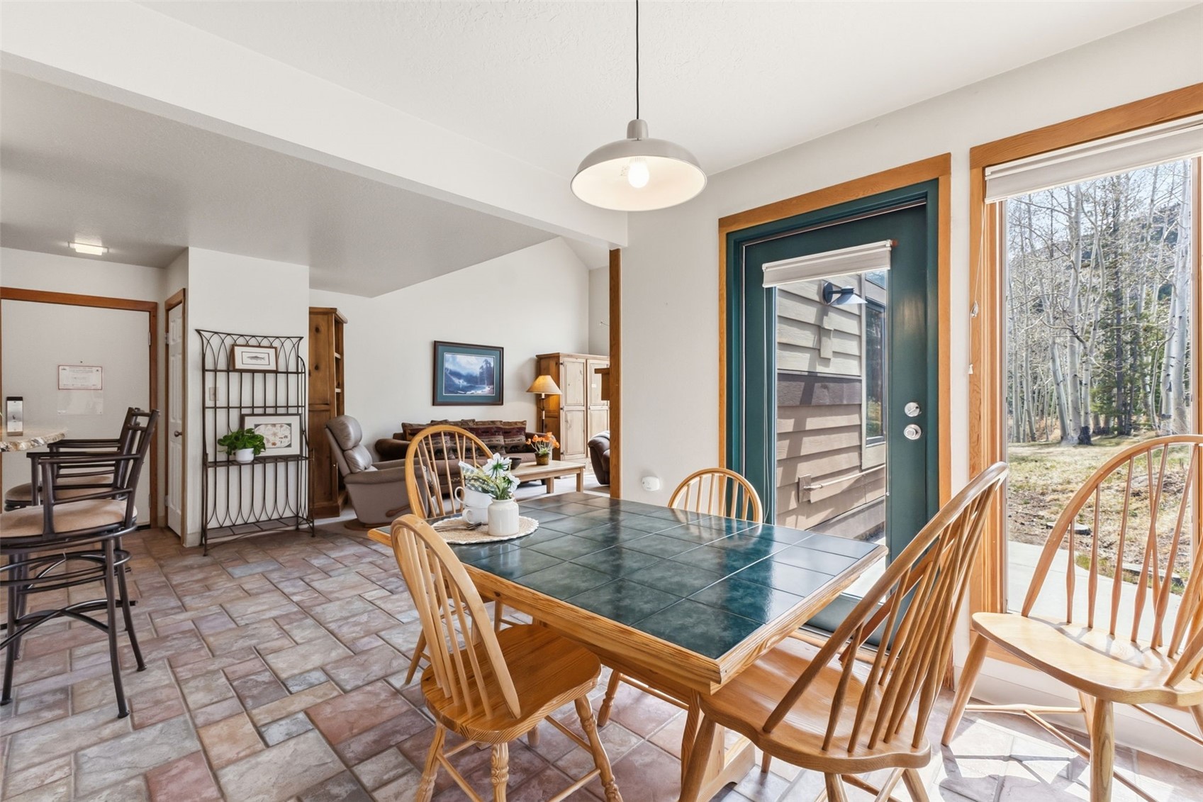 30 Tennis Club Road, Unit 1608 Keystone, CO 80435 - Photo 6 of 29 a dining room with furniture and wooden floor