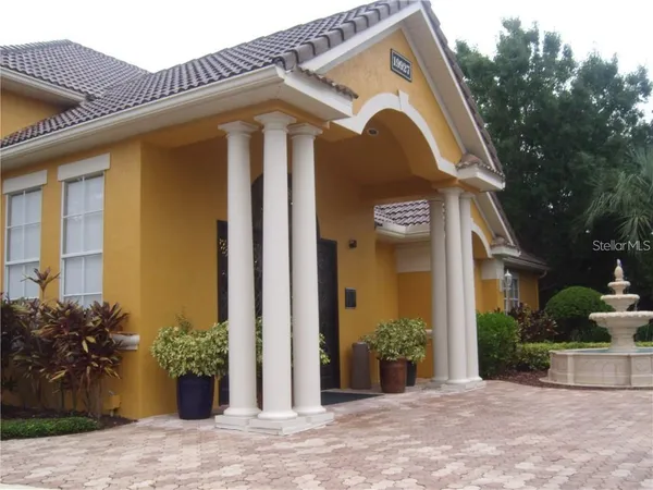 a front view of a house with swimming pool