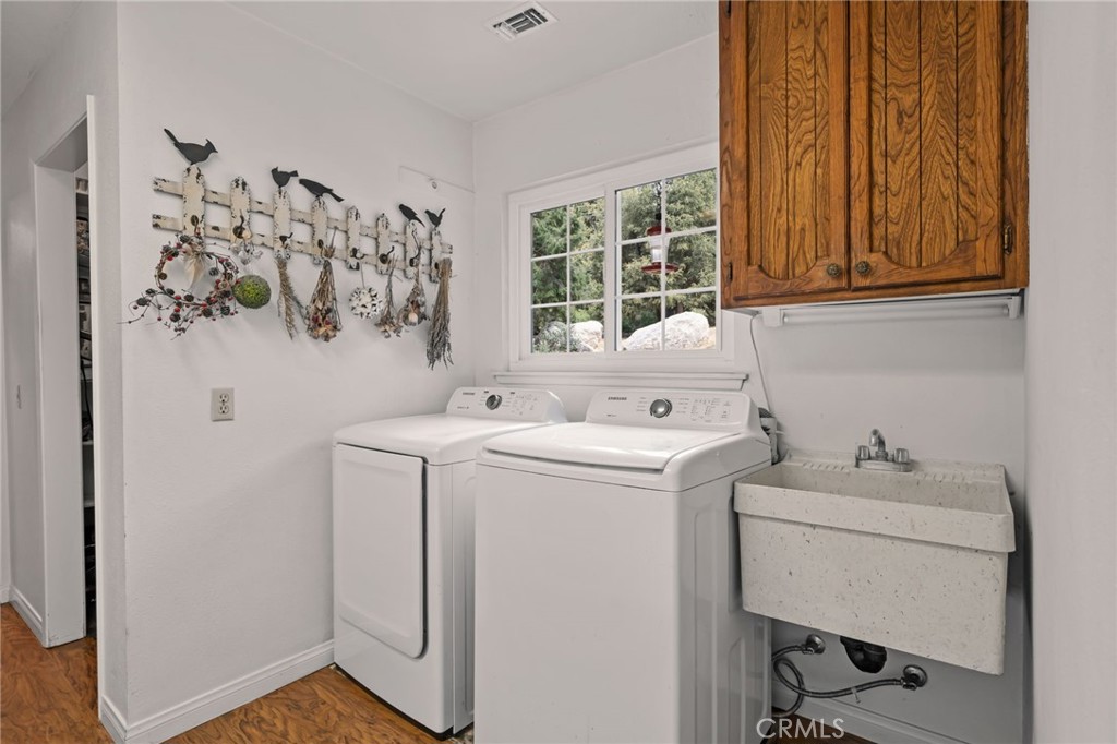 39804 Pine Bench Road Yucaipa, CA 92399 - Photo 12 of 57 Laundry with sink