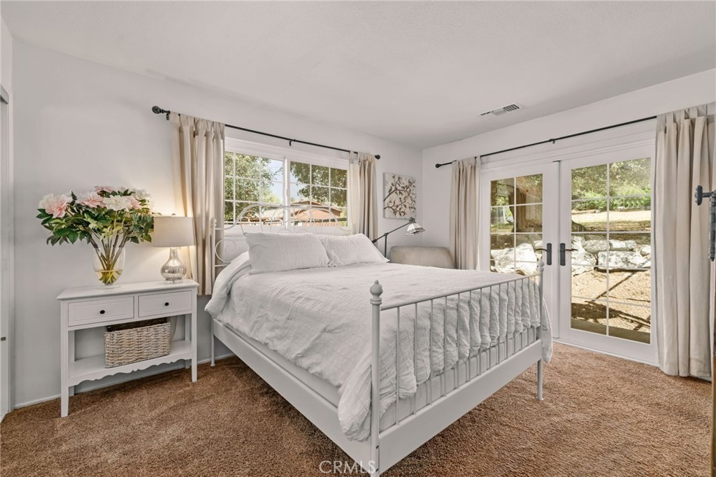 39804 Pine Bench Road Yucaipa, CA 92399 - Photo 17 of 57 Primary Bedroom with french doors