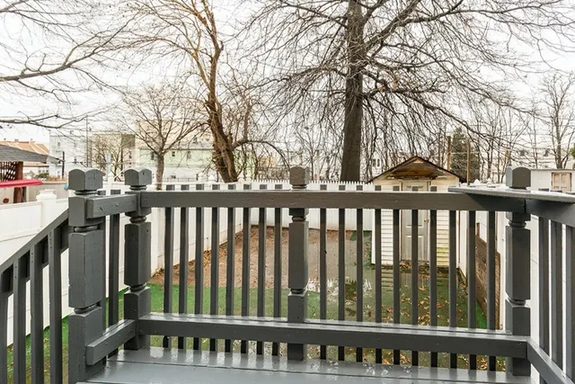 a view of a wooden fence