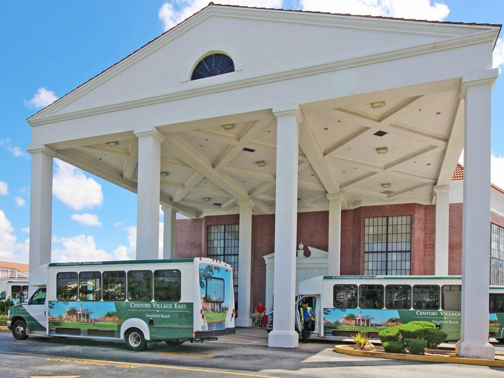 2009 Berkshire A, Unit 2009 Deerfield Beach, FL 33442 - Photo 36 of 57 a car parked in front of a building