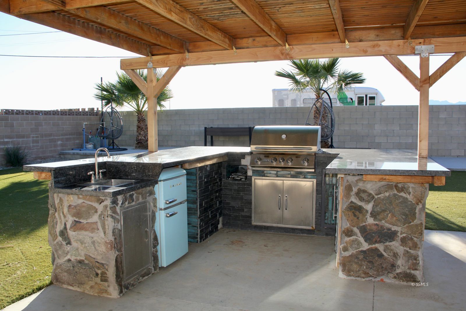 333 Traci Lane Ridgecrest, CA 93555 - Photo 26 of 30 a kitchen with a stove and a sink