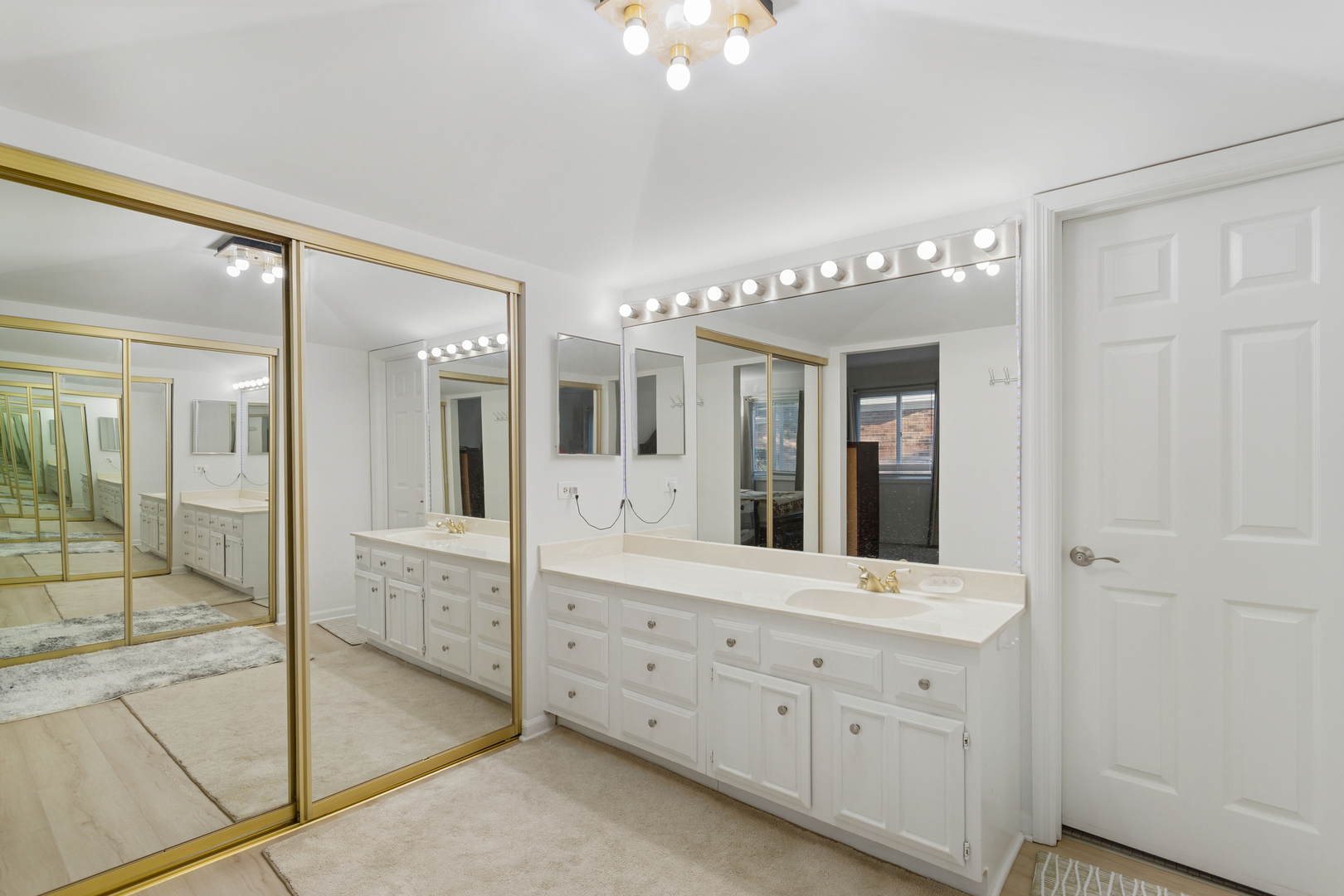 7235 Willow Way Lane, Unit B Willowbrook, IL 60527 - Photo 11 of 20 a spacious bathroom with a double vanity sink and a mirror