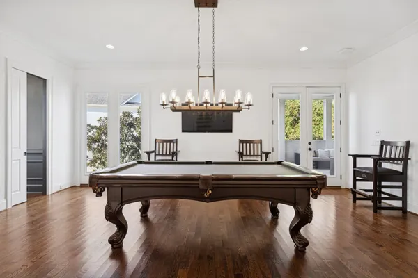 a kitchen with a stove a sink and a refrigerator
