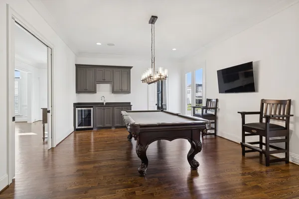 a view of an entryway with wooden floor