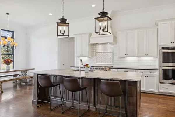 a bathroom with a sink a vanity and a mirror