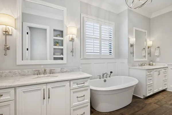 an aerial view of a house with a yard and garden