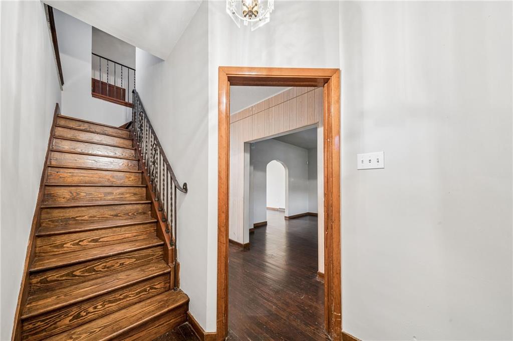 620 Broadway Avenue McKees Rocks, PA 15136 - Photo 7 of 18 a view of a hallway with wooden floor and entryway