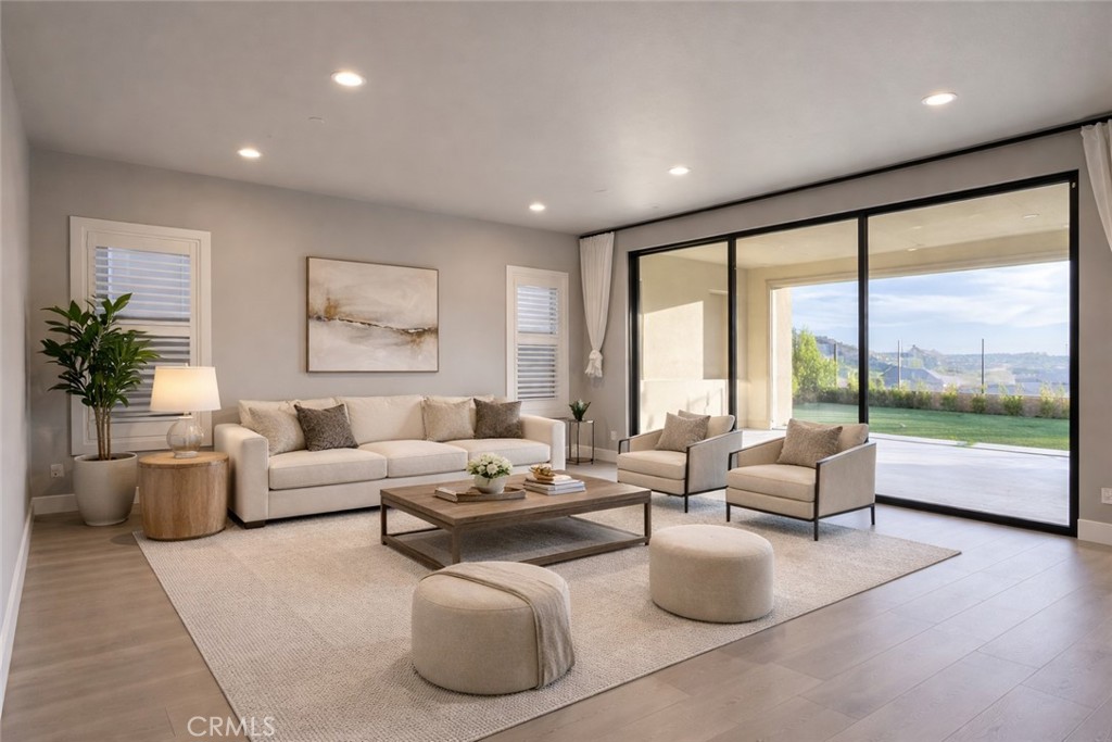 20538 Deer Grass Court Porter Ranch, CA 91326 - Photo 3 of 34 This image has been virtually staged for illustrative purposes only. Furniture and décor are not included in the sale of the property.