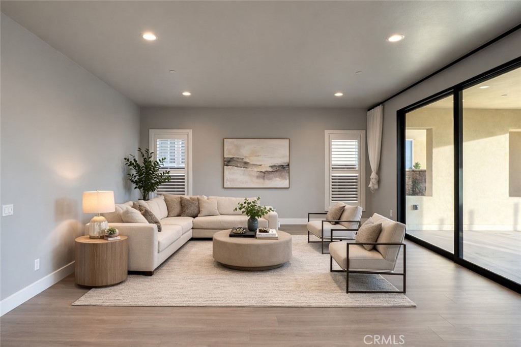 20538 Deer Grass Court Porter Ranch, CA 91326 - Photo 4 of 34 This image has been virtually staged for illustrative purposes only. Furniture and décor are not included in the sale of the property.