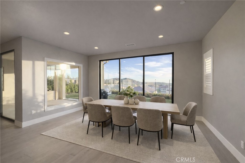 20538 Deer Grass Court Porter Ranch, CA 91326 - Photo 10 of 34 This image has been virtually staged for illustrative purposes only. Furniture and décor are not included in the sale of the property.