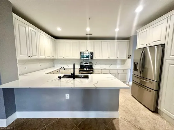 $585,000 | 9270 Campanile Circle, Unit 102, Naples, FL 34114