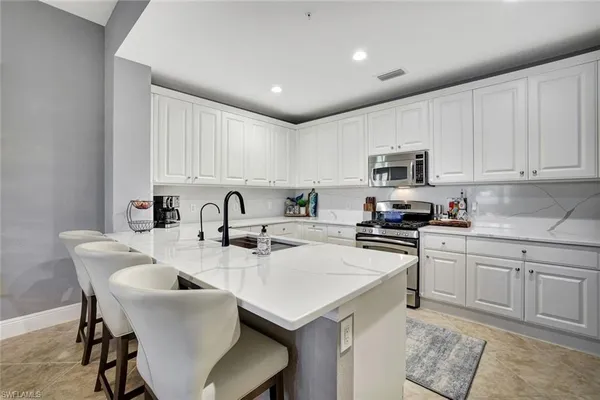 $585,000 | 9270 Campanile Circle, Unit 102, Naples, FL 34114