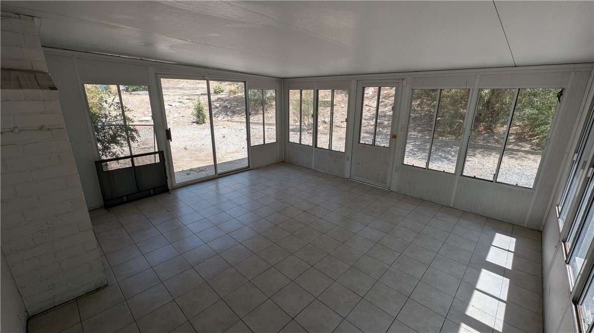 2566 Flanders Road Riverside, CA 92507 - Photo 6 of 16 a view of an empty room with a window