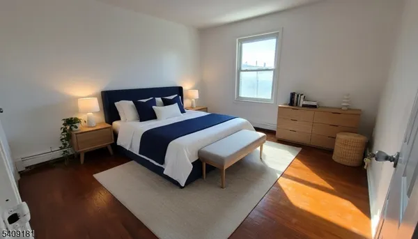 a bed room with a bed and a window