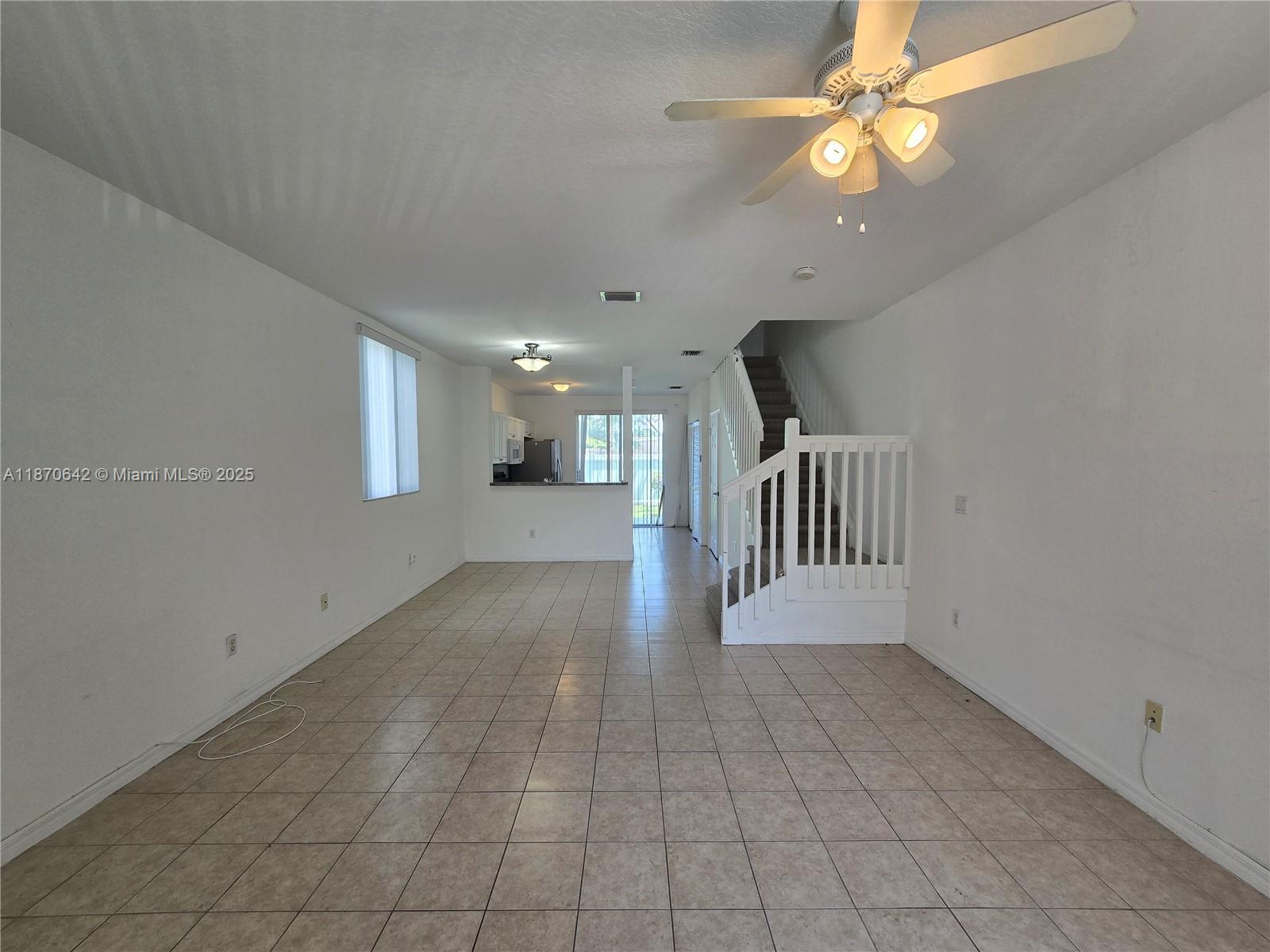 3632 Oleander Terrace, Unit 3632 Riviera Beach, FL 33404 - Photo 2 of 26 an entryway in a hall with a window