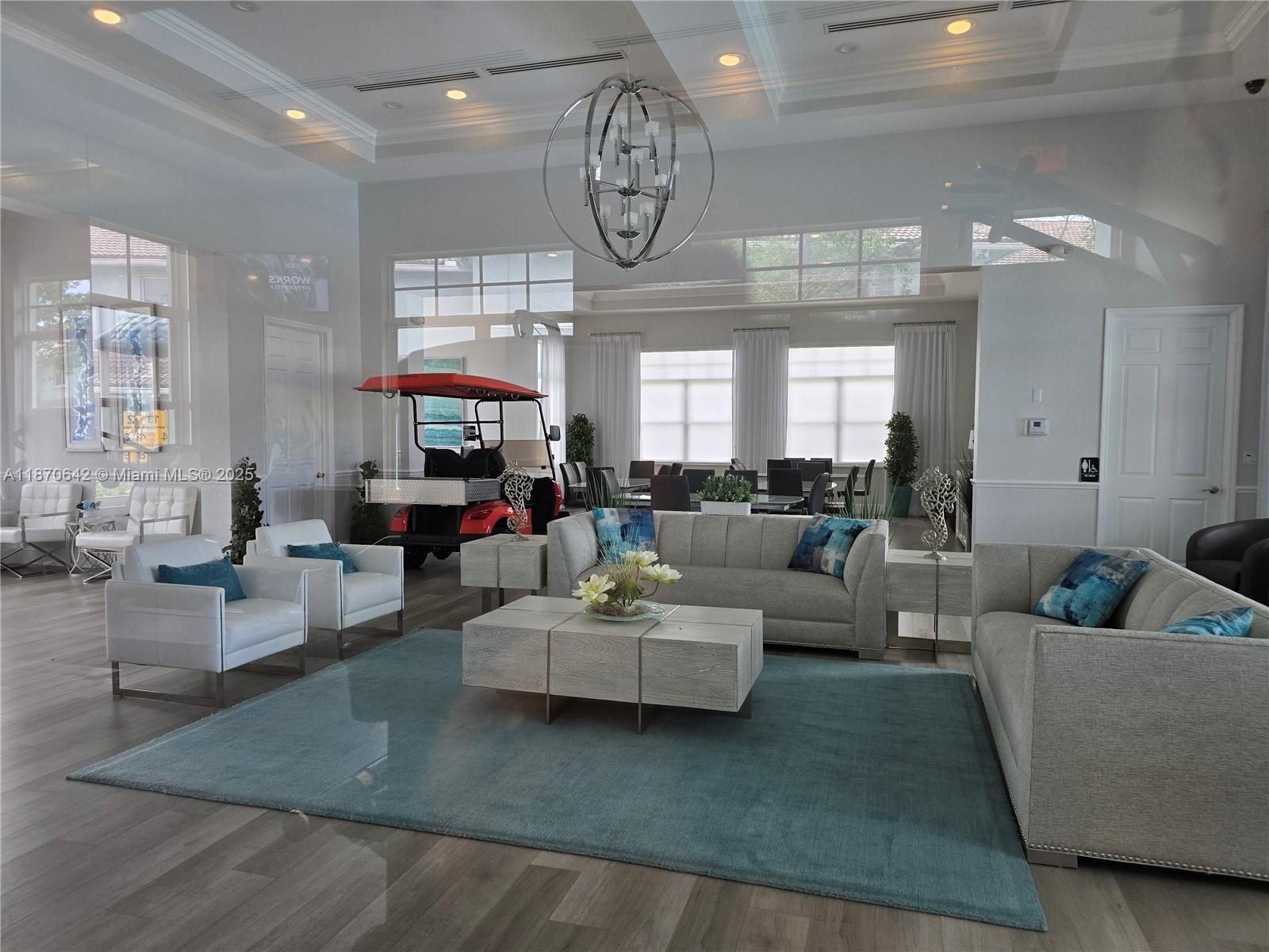 3632 Oleander Terrace, Unit 3632 Riviera Beach, FL 33404 - Photo 25 of 26 a living room with furniture and a large window