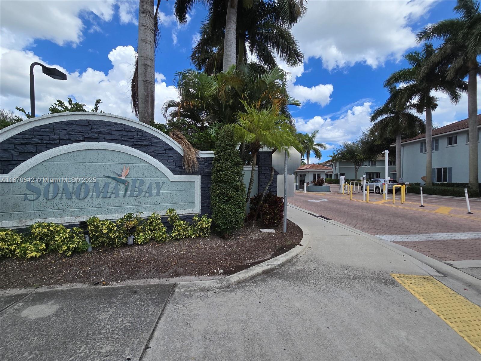 3632 Oleander Terrace, Unit 3632 Riviera Beach, FL 33404 - Photo 26 of 26 a front view of a building with garden