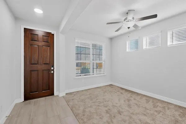 an empty room with windows