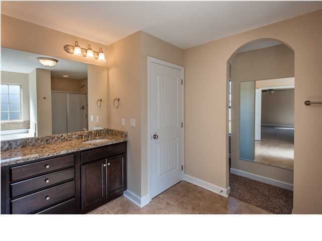 4560 Hermosa Road Crestview, FL 32539 - Photo 13 of 26 a bathroom with a sink and a mirror