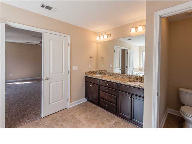 4560 Hermosa Road Crestview, FL 32539 - Photo 14 of 26 a bathroom with a sink vanity granite and a mirror