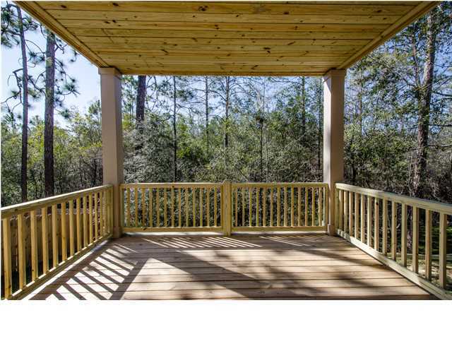 4560 Hermosa Road Crestview, FL 32539 - Photo 19 of 26 a view of a wooden deck